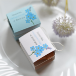 doniczki z nasionkami niezapominajek  - upominki na dzień kobiet (minimalne zamówienie 15 szt.)