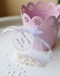 białe woreczki - podziękowania na chrzest święty KWIATY  (minimalne zamówienie 15 szt.) 